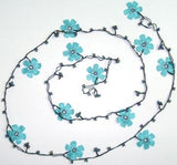 BLUE OYA Flower Lariat Necklace with black strand and purplish black beads